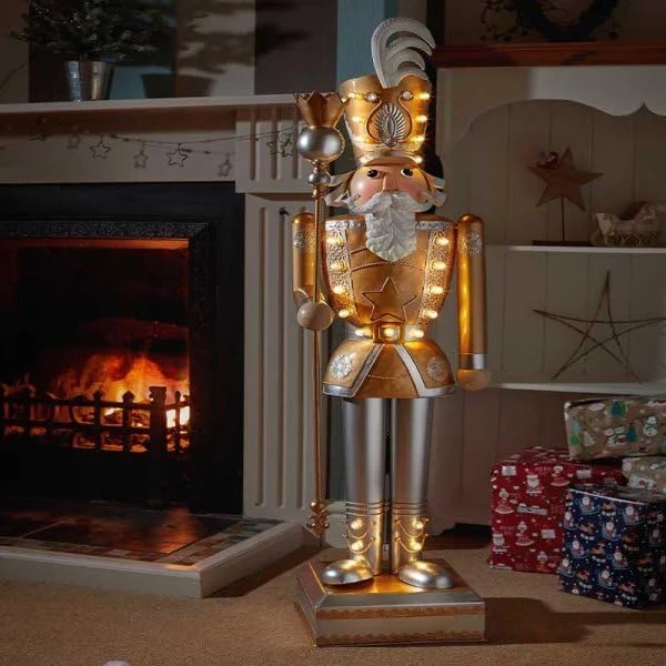 120 cm gold and white metal nutcracker with 23 warm white LEDs