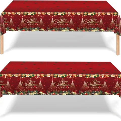 2 red plastic Christmas tablecloths, 137 x 274 cm, Santa and holly