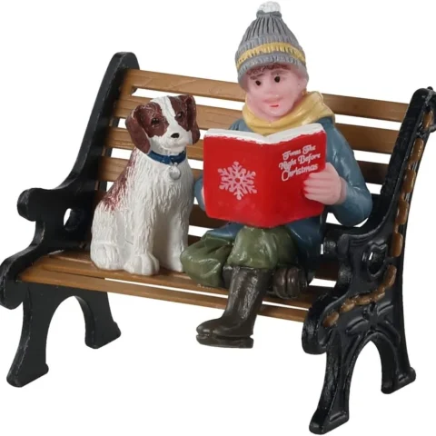 A Christmas Tale boy and puppy village figurine, 4.8 cm tall