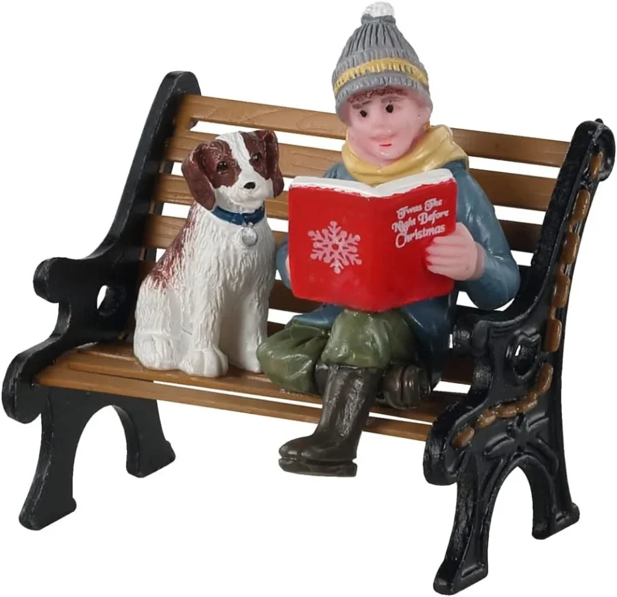 A Christmas Tale boy and puppy village figurine, 4.8 cm tall