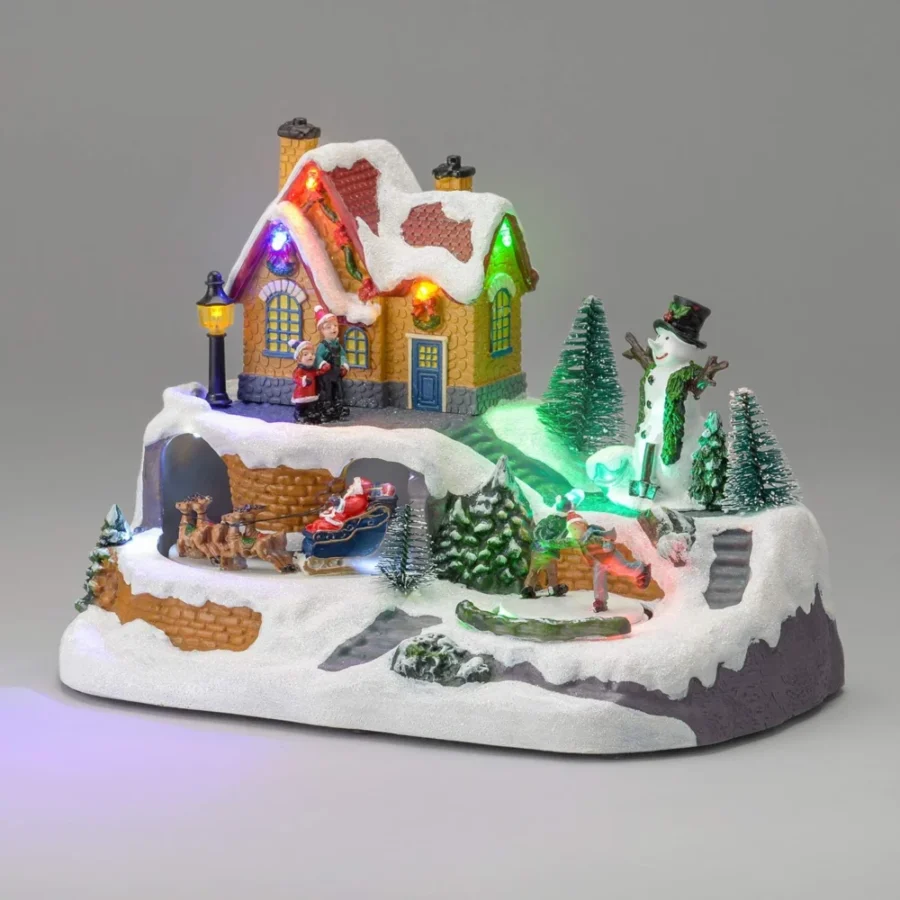 Animated ice skating village scene with 9 LEDs and 8 jingles