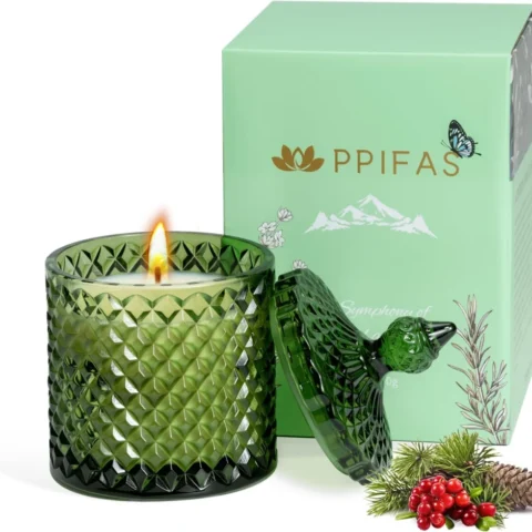 Christmas tree scented soy wax candle in an embossed glass jar