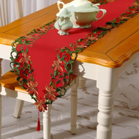 Embroidered red poinsettia table runner with tassels, 38 x 176 cm