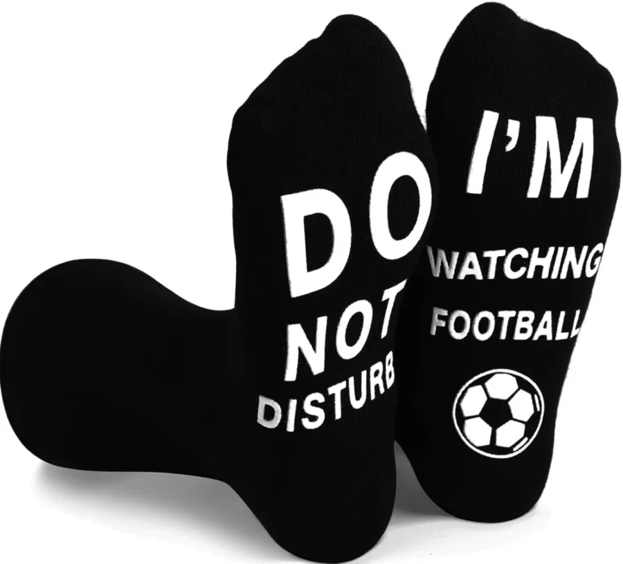 Football novelty socks with a funny message printed on the sole