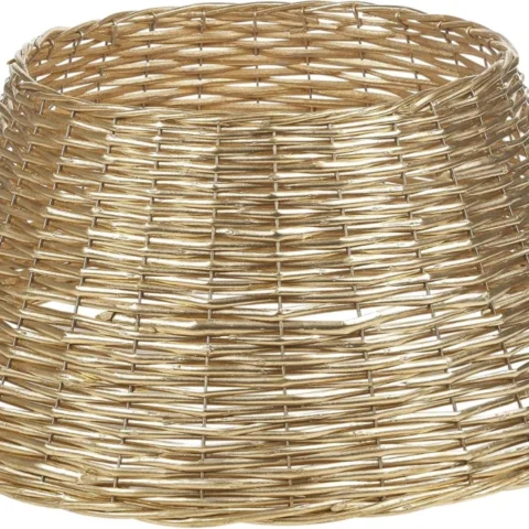 Gold woven rattan tree skirt, 56 cm wide, 25 cm high
