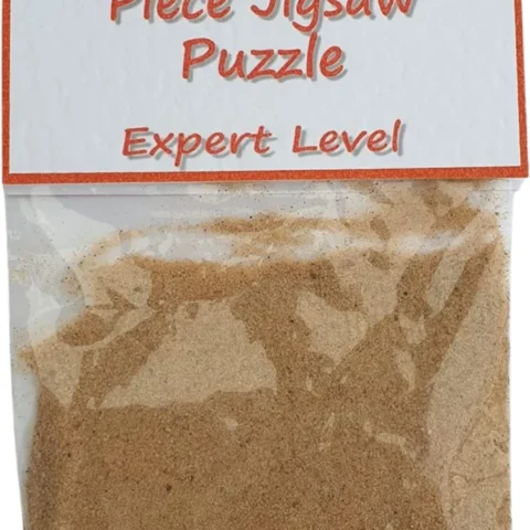 Joke million piece jigsaw: sand in a zip seal bag, 11.5 x 9 cm