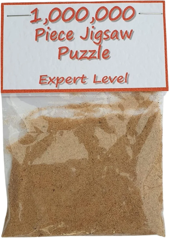 Joke million piece jigsaw: sand in a zip seal bag, 11.5 x 9 cm