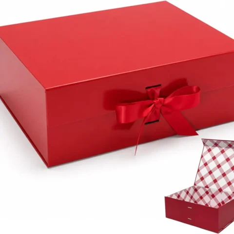 Large red magnetic gift box with plaid lining and ribbon