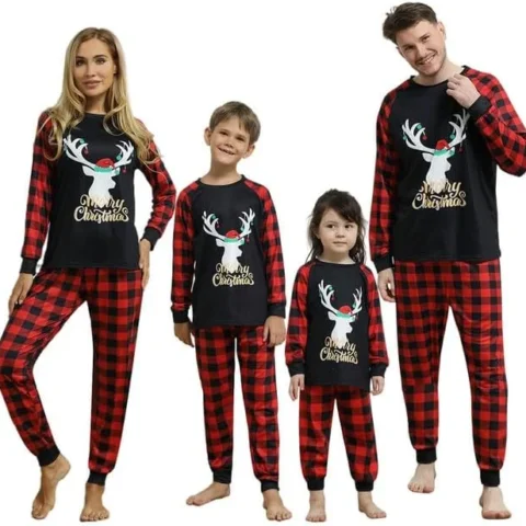 Matching family Christmas pyjamas in black with a deer design