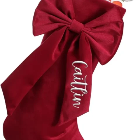Personalised cable-knit Christmas stocking with a bow, 46 cm