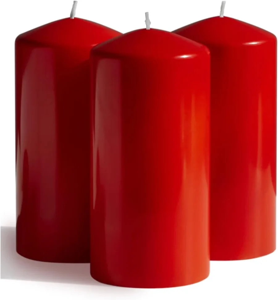 Three red cone-top pillar candles, 15 cm, unscented, dripless