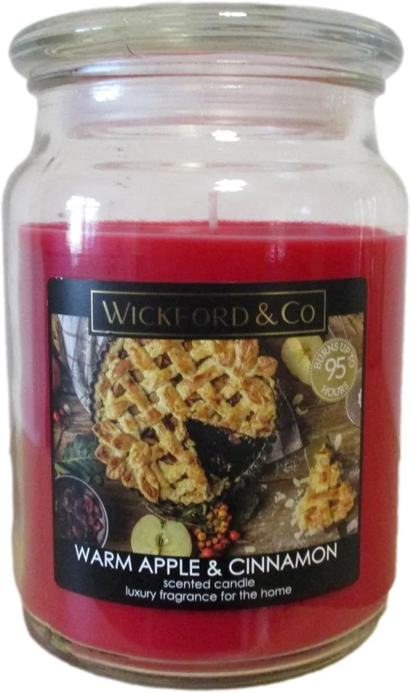 Warm apple and cinnamon scented candle in a lidded glass jar, 18 oz