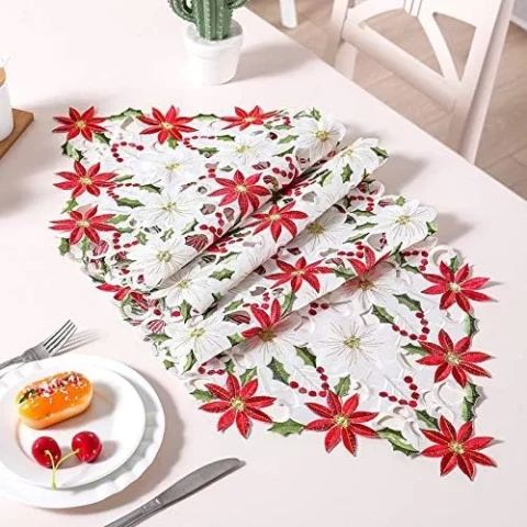White cotton table runner with embroidered poinsettia, 38 x 176 cm